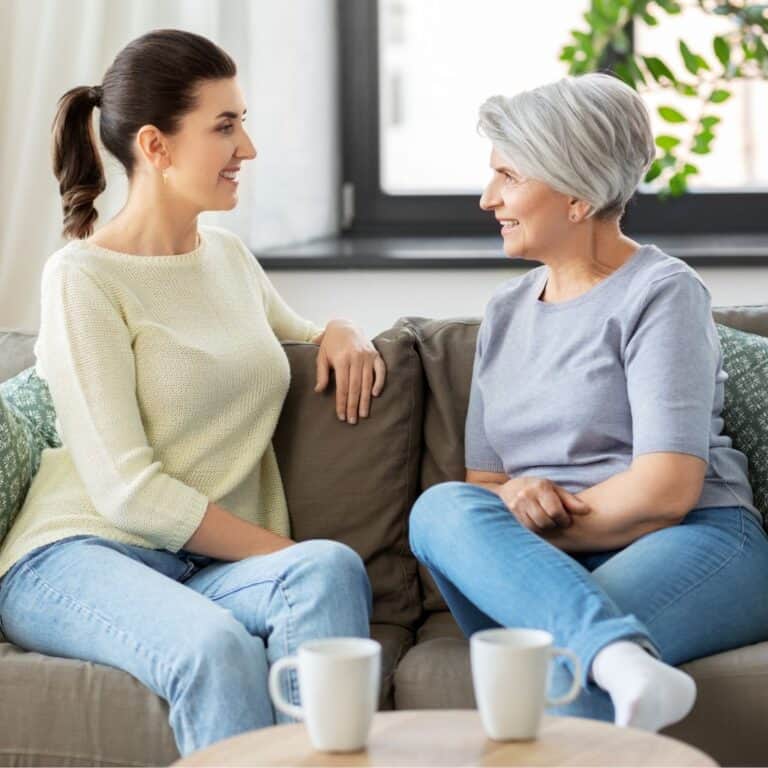 2 women talking on a couch representing giving the gospel