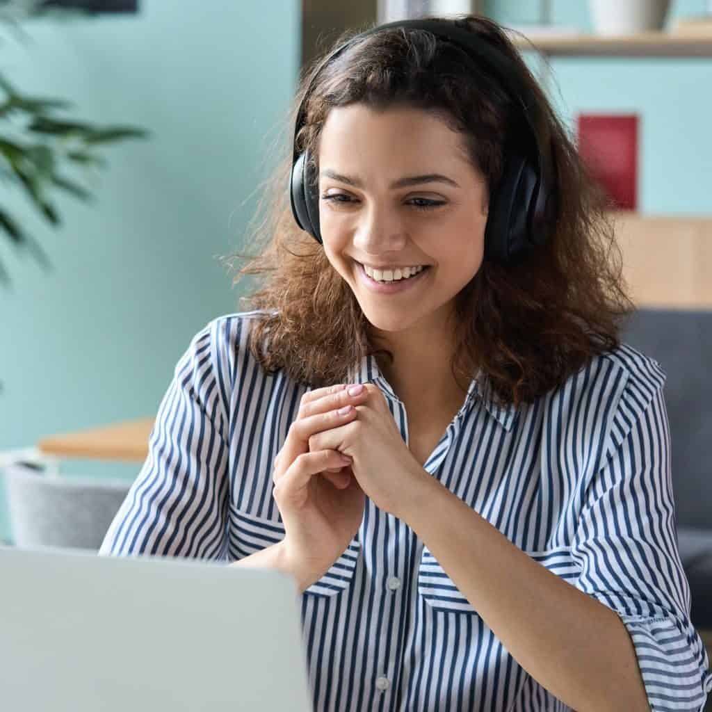 Opening and Closing Prayers for Online Class Woman smiling at online class